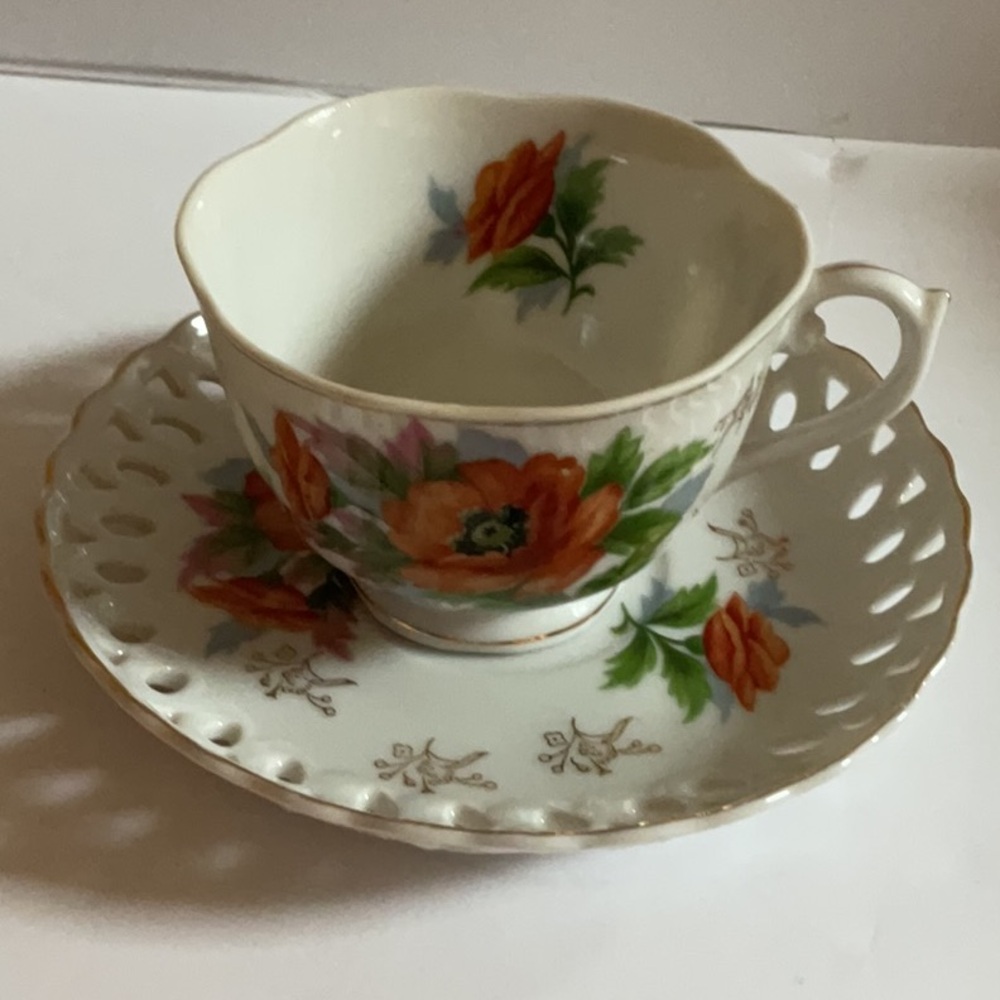Vintage ESD Japan hand painted cup and saucer